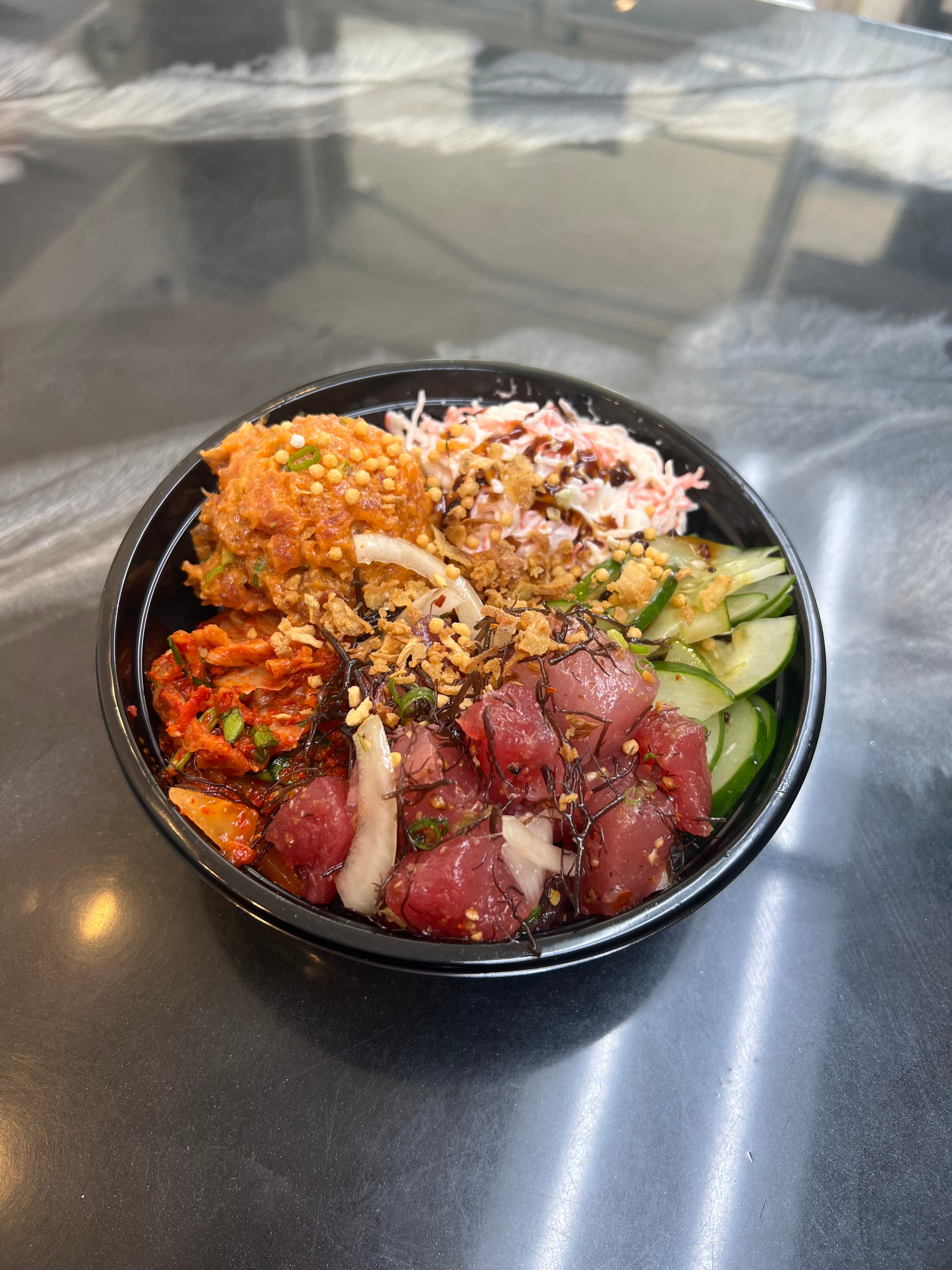 Mama Kim's poke bowl with kimchi and fresh toppings